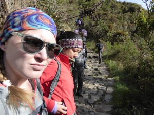 Steffi and Katie on a typical section of uphill path, being overtaken by running porters